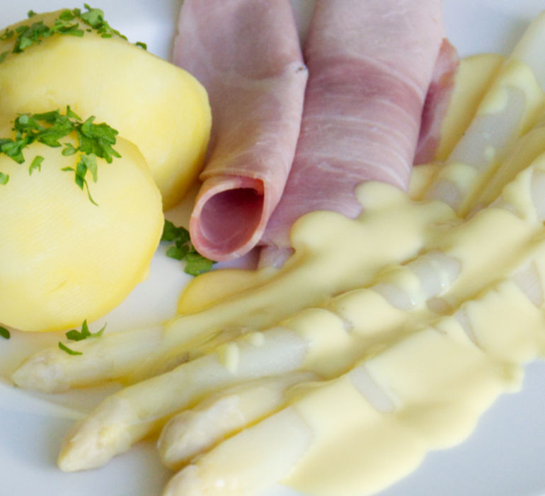 Traditional German White Asparagus Ham, Boiled Potatoes and Sauce Hollandaise