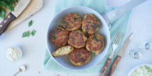 German Fish Meatballs in a pan with parsley from above